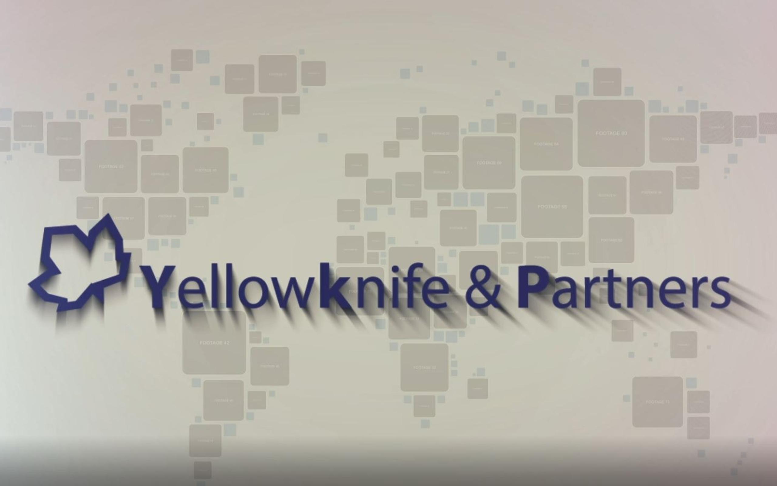 Frame from the corporate video: the Yellowknife & Partners logo animated over a world map