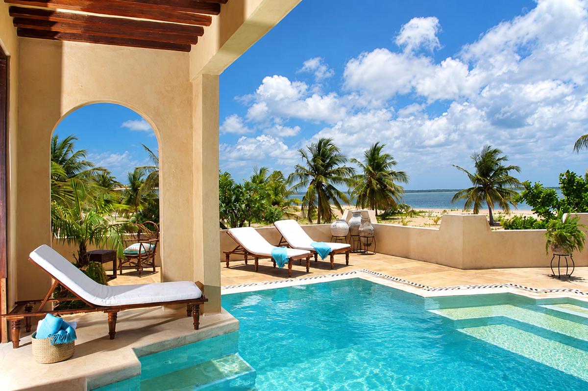 Arched terrace above a pool with loungers and an ocean view