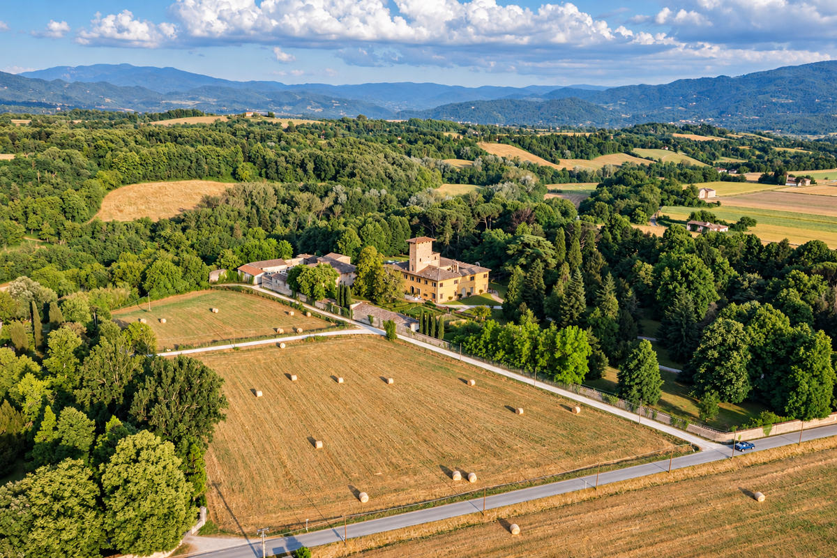 The Mugello valley from above, the castle among fields, woods and hills