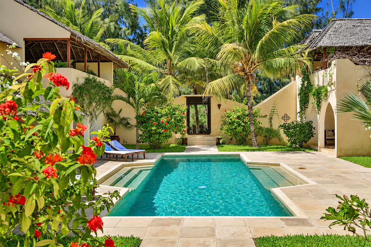 Garden courtyard pool with red flowers
