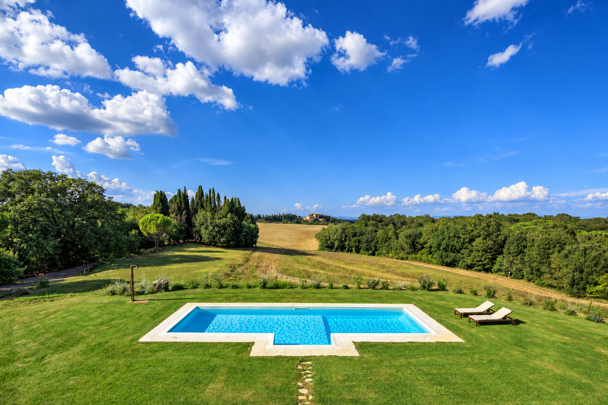 Private pool on the lawn overlooking the countryside