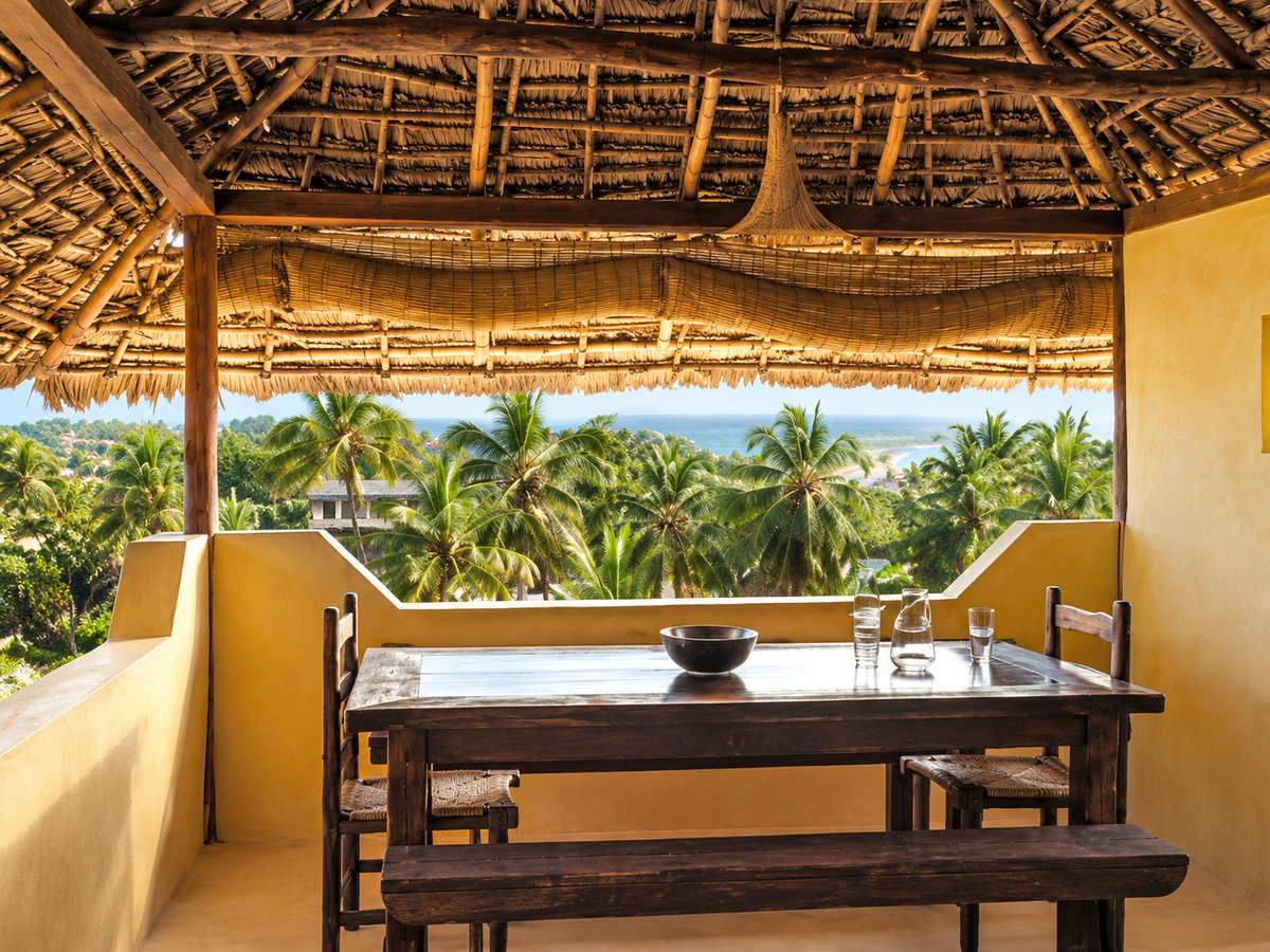 Rooftop dining table above the palms