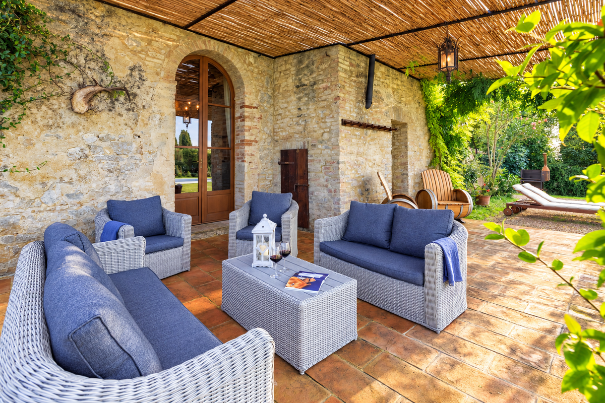 Shaded terrace lounge under a cane roof