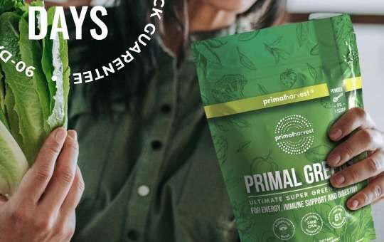 holding primal greens powder