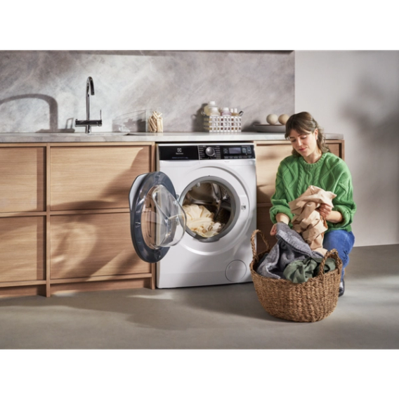 a woman unloading laundry