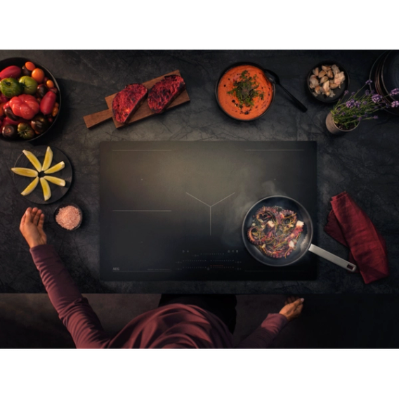 AEG induction hob in use