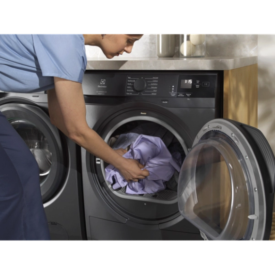 unloading TUMBLE DRYER