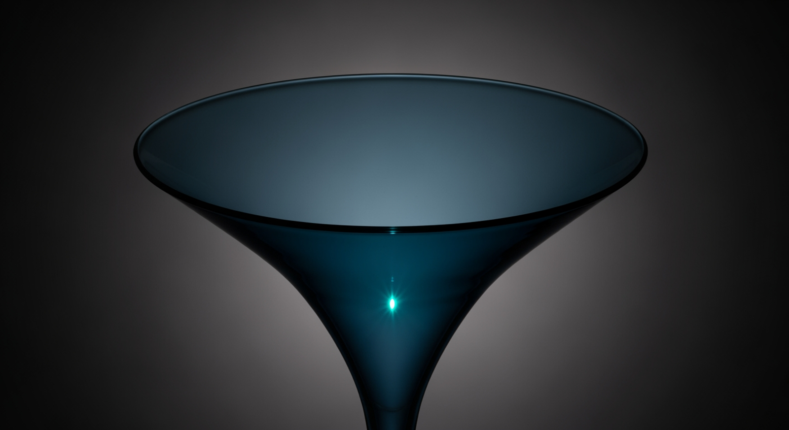 Funnel of translucent glass narrowing toward a point of teal light — capacity