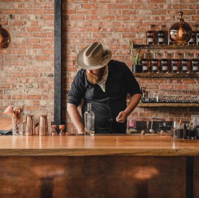 A bartender making a cocktail