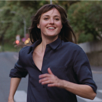 A woman running down the street