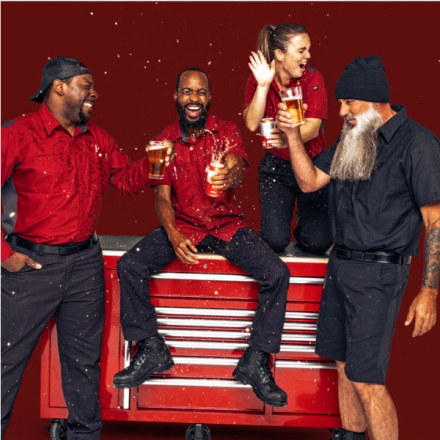 employees celebrating wearing their Red Kap workwear