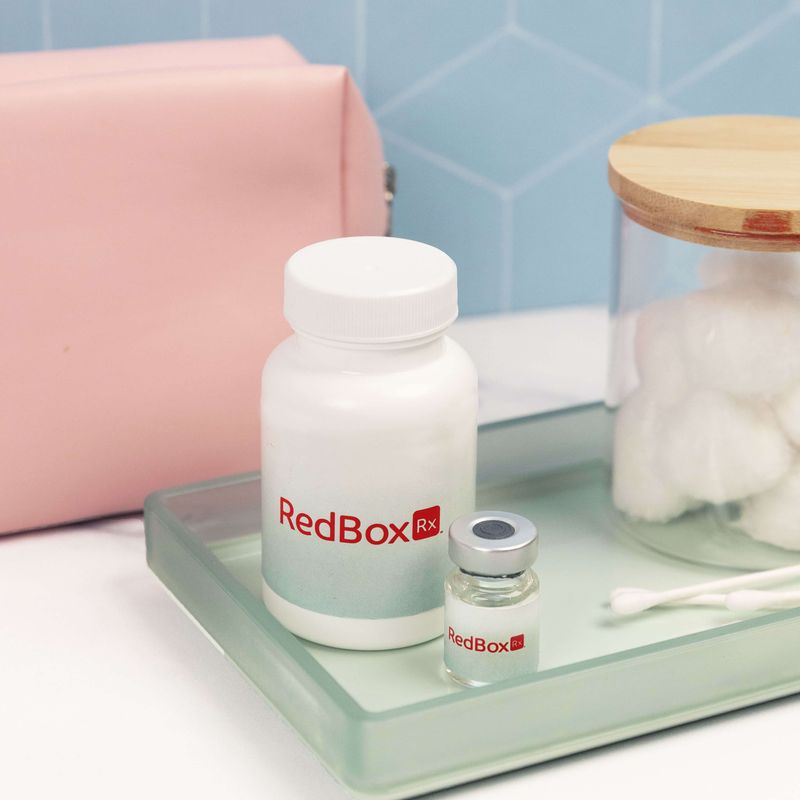 RedBox Rx Med Bottle and Vial Sitting on Tray in Bathroom