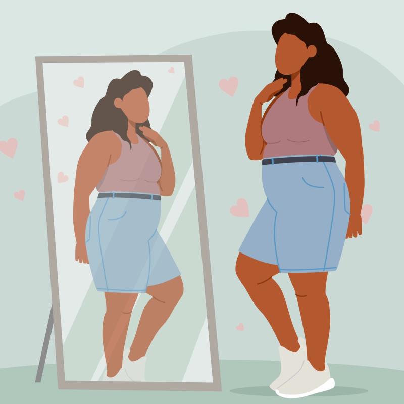 Overweight Woman Looking in Full-Length Mirror