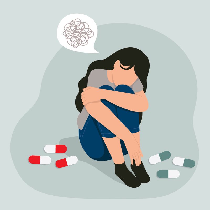 Illustration of a depressed woman deciding between Auvelity and Bupropion