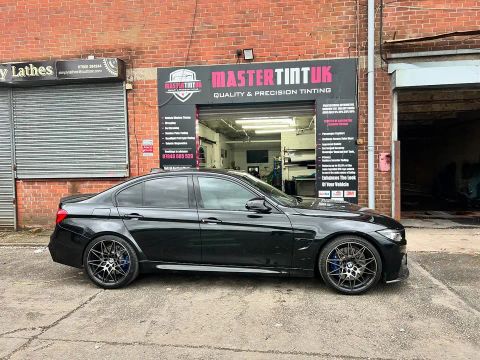 BMW M3 Competition finished outside MasterTint UK on Weston Street, Bolton