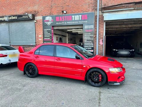 Mitsubishi Evo finished outside MasterTint UK on Weston Street, Bolton