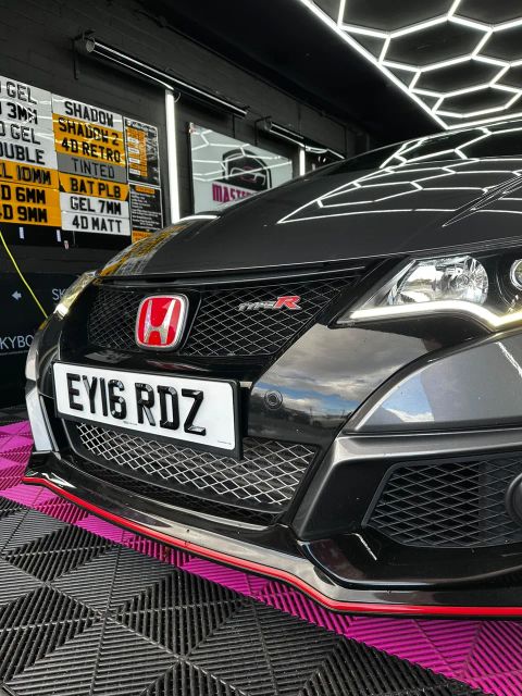 Front of a grey Honda Civic Type R in the MasterTint UK bay, Weston Street, Bolton