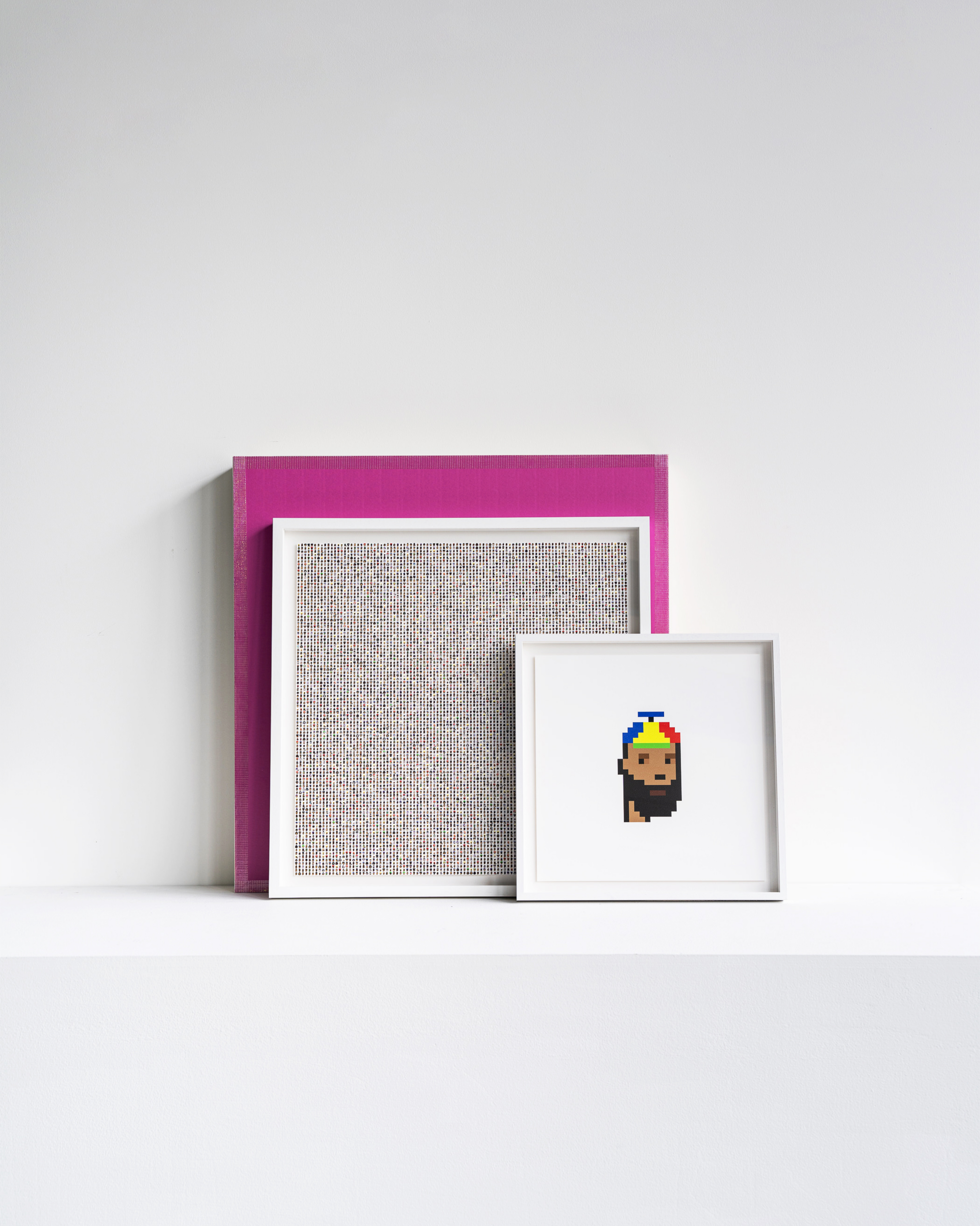 art sat against white wall