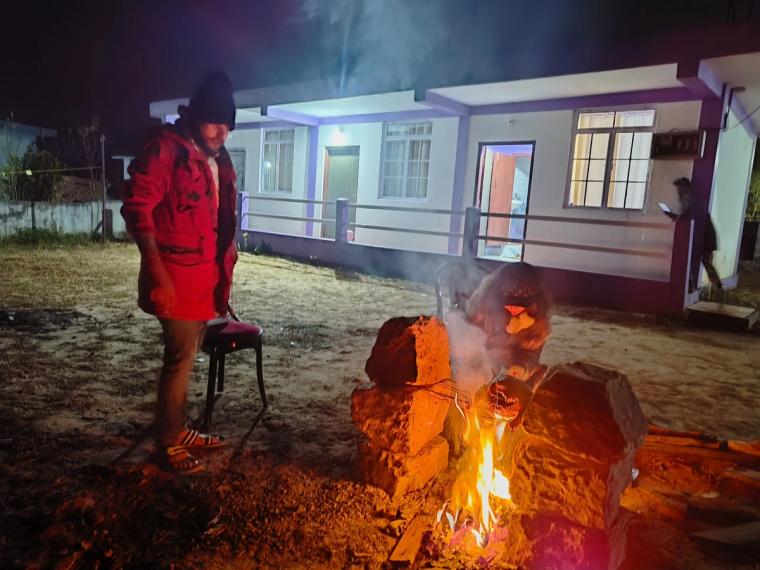 Simple house in Cherrapunji with a fire pit