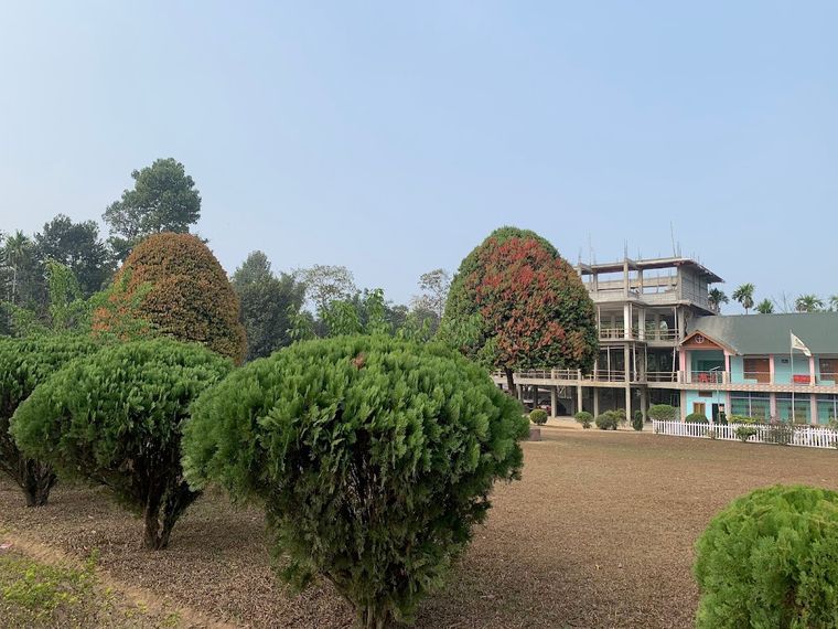 Lawn & church views: Williamnagar homestay, Meghalaya