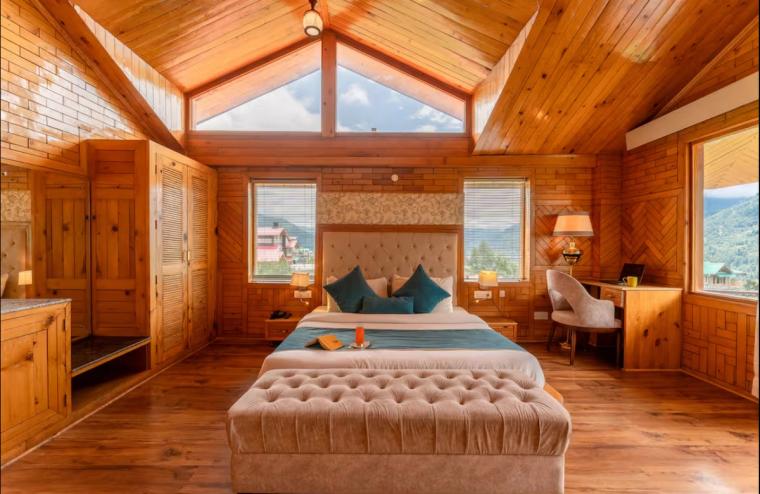 House in Manali with snow-peak views