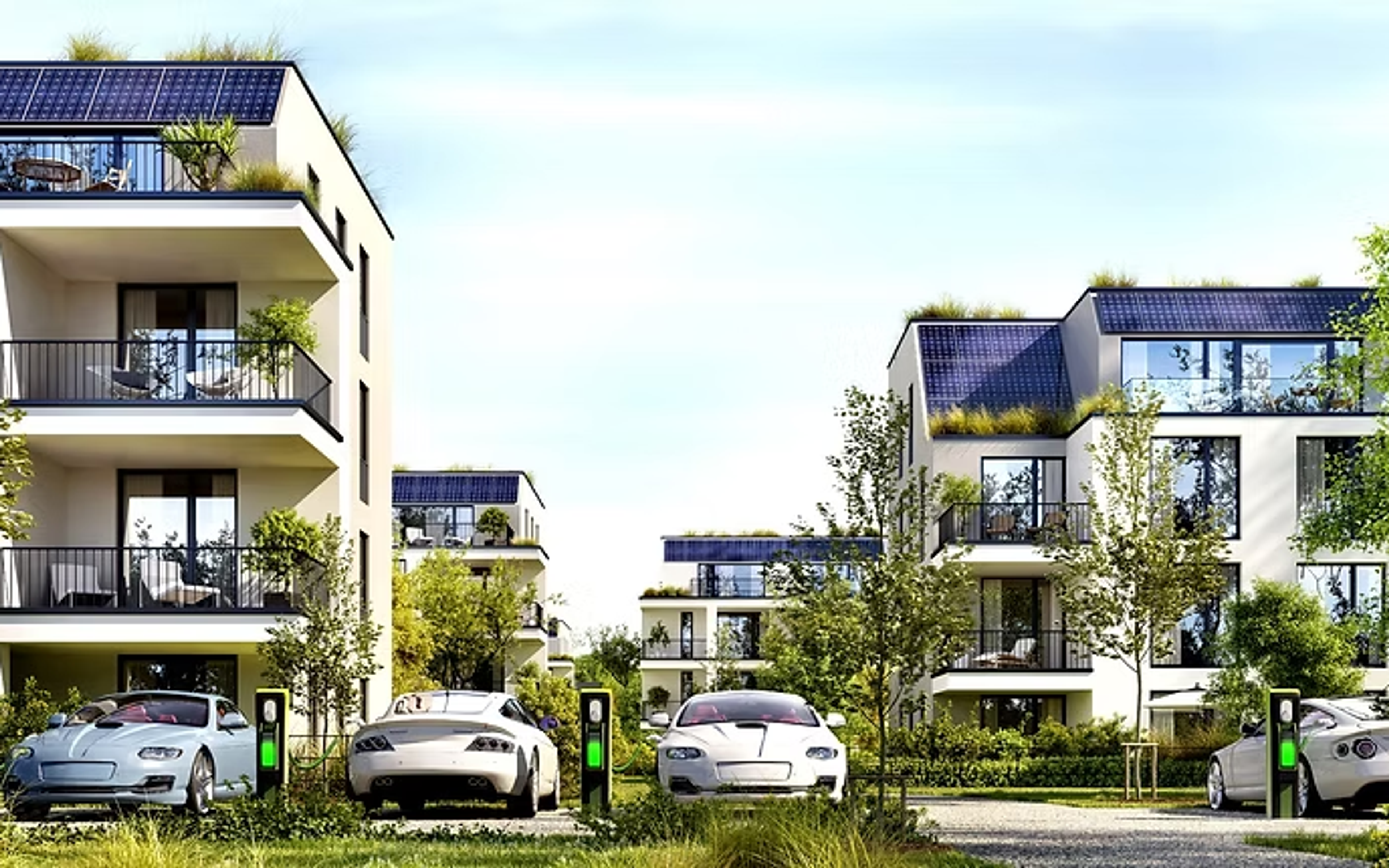 Flervåningshus med solpaneler, gröna tak och laddstolpar för elbilar på gården