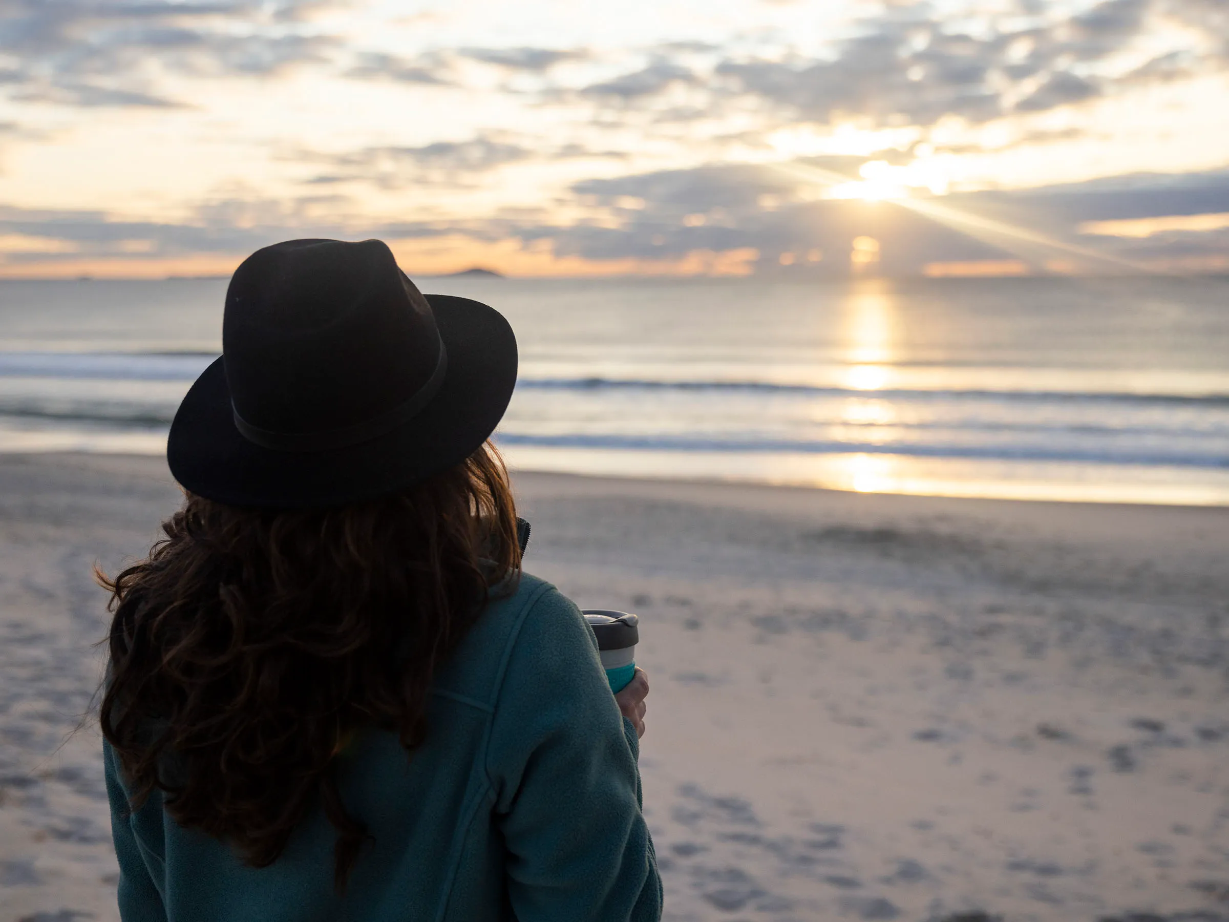 Reflections Holidays Hawks Nest holiday & caravan park person looking over Bennetts Beach