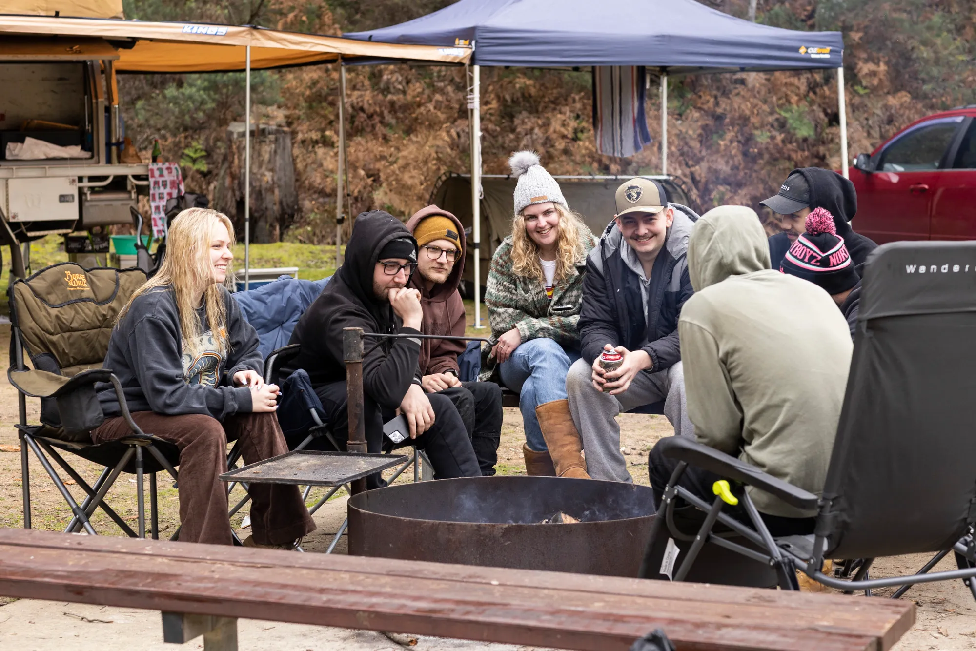 Friends around a fire in a NSW park