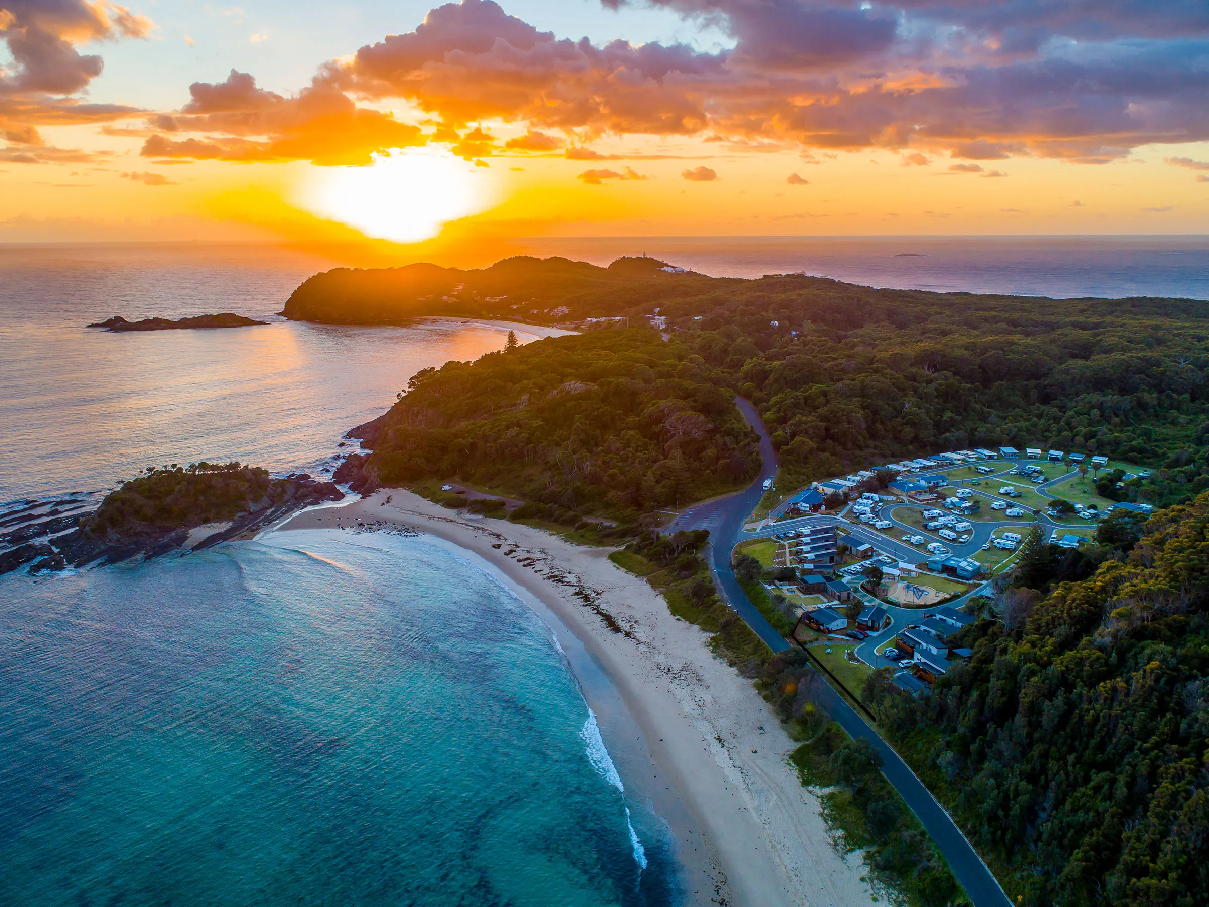 Reflections Seal Rocks holiday and caravan park sunrise over Number one Beach