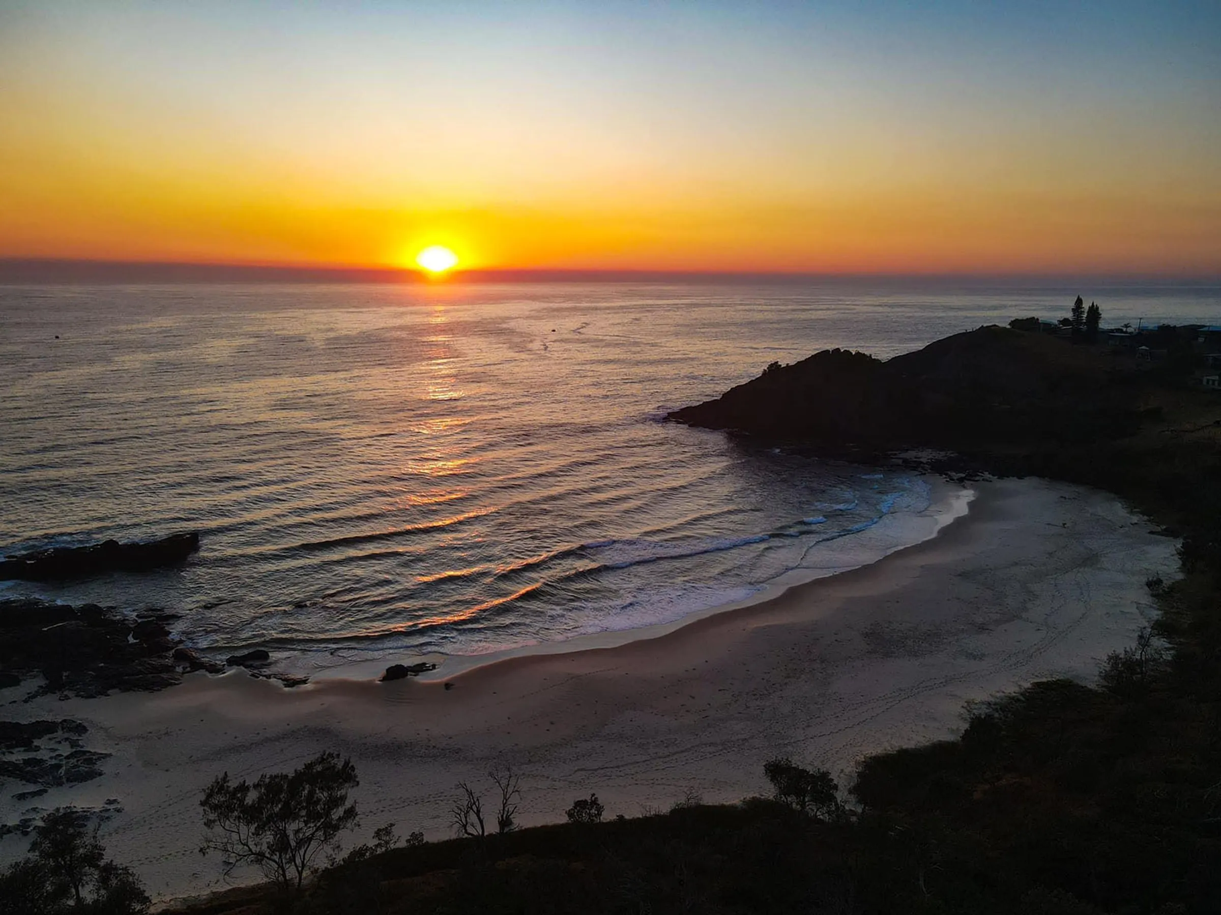 Scotts Head sunrise over the beach - Ambassador Belinda Mordue