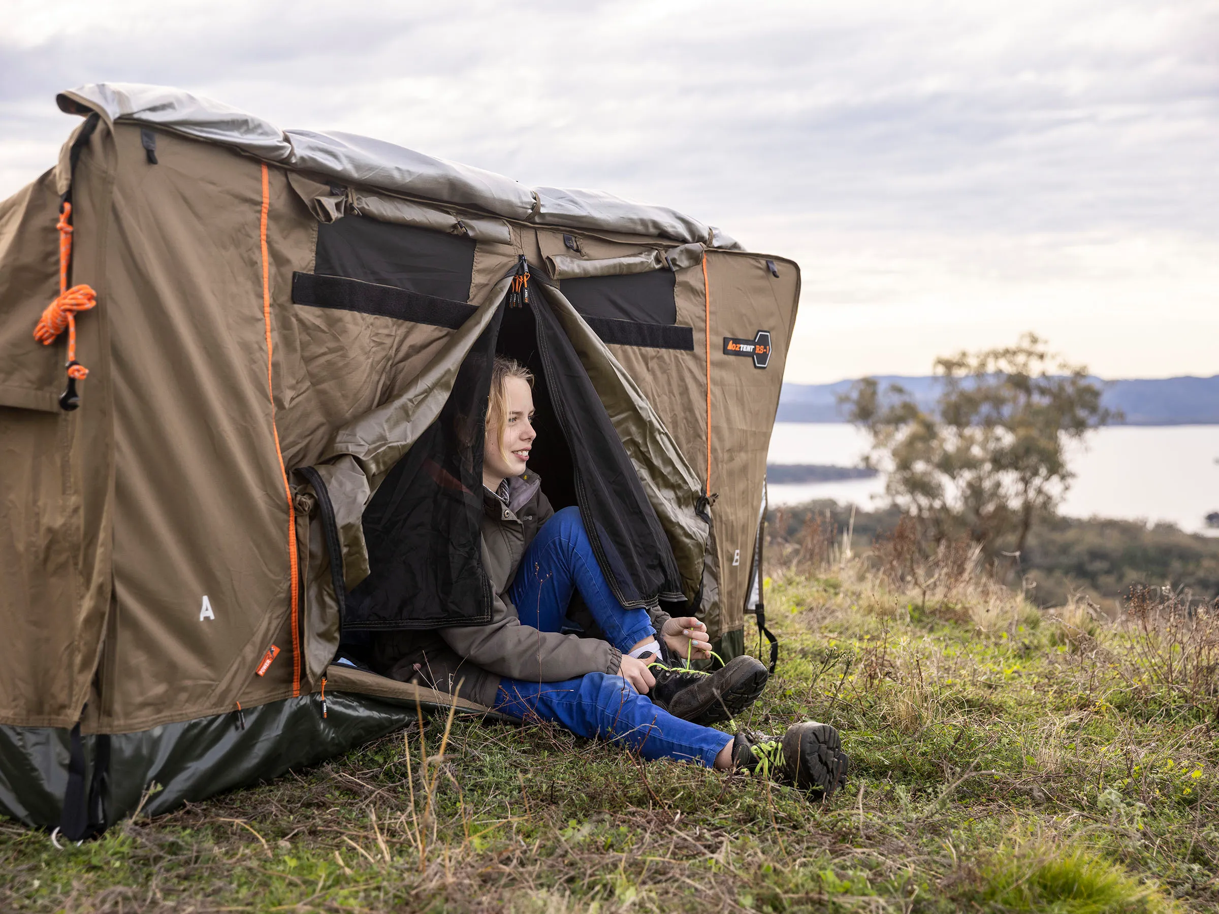 Reflections Holidays Lake Burrendong holiday and caravan park girl sitting in camping tent