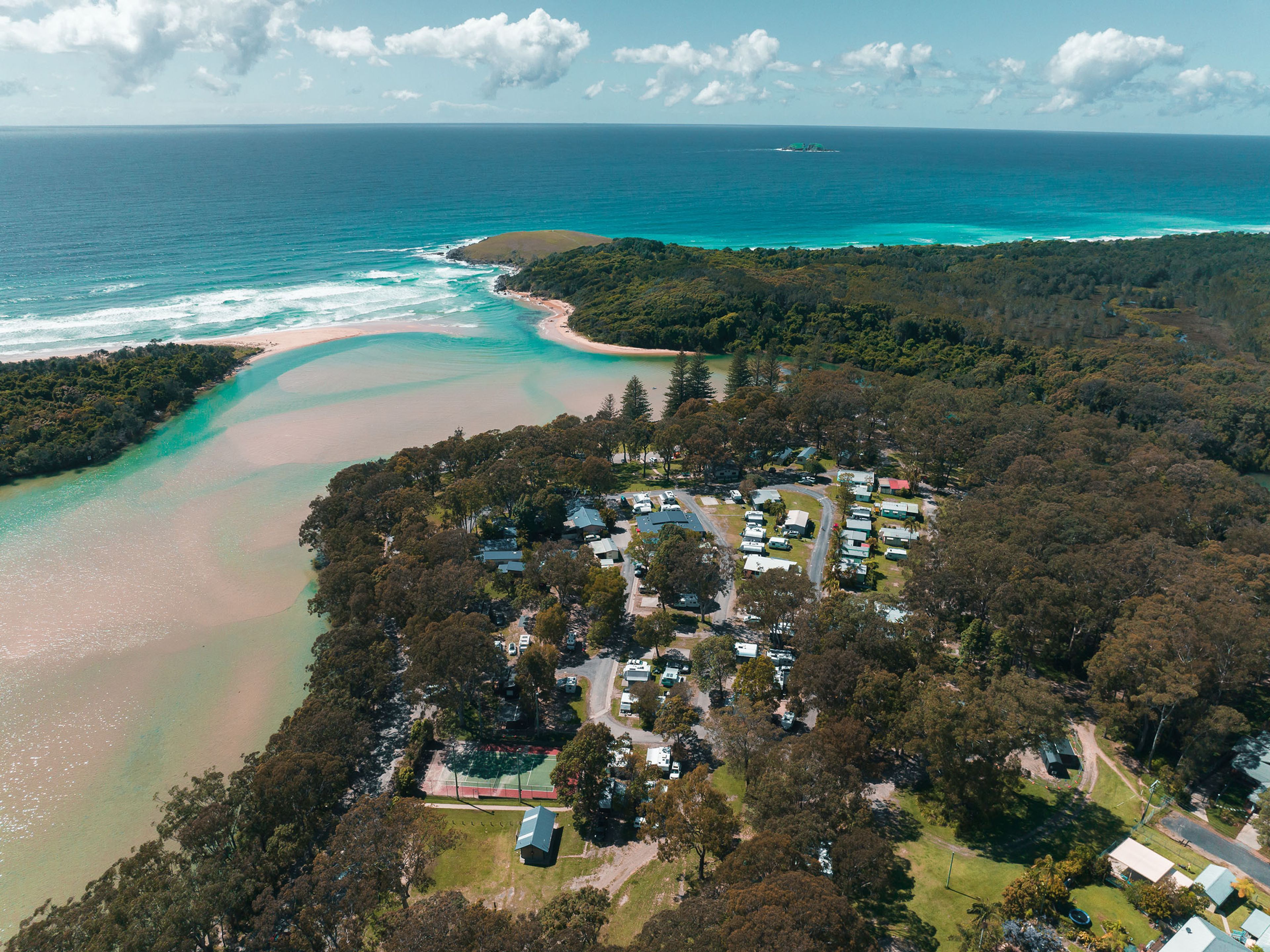 Reflections Moonee Beach holiday & caravan park ariel drone shot overlooking the park and beach