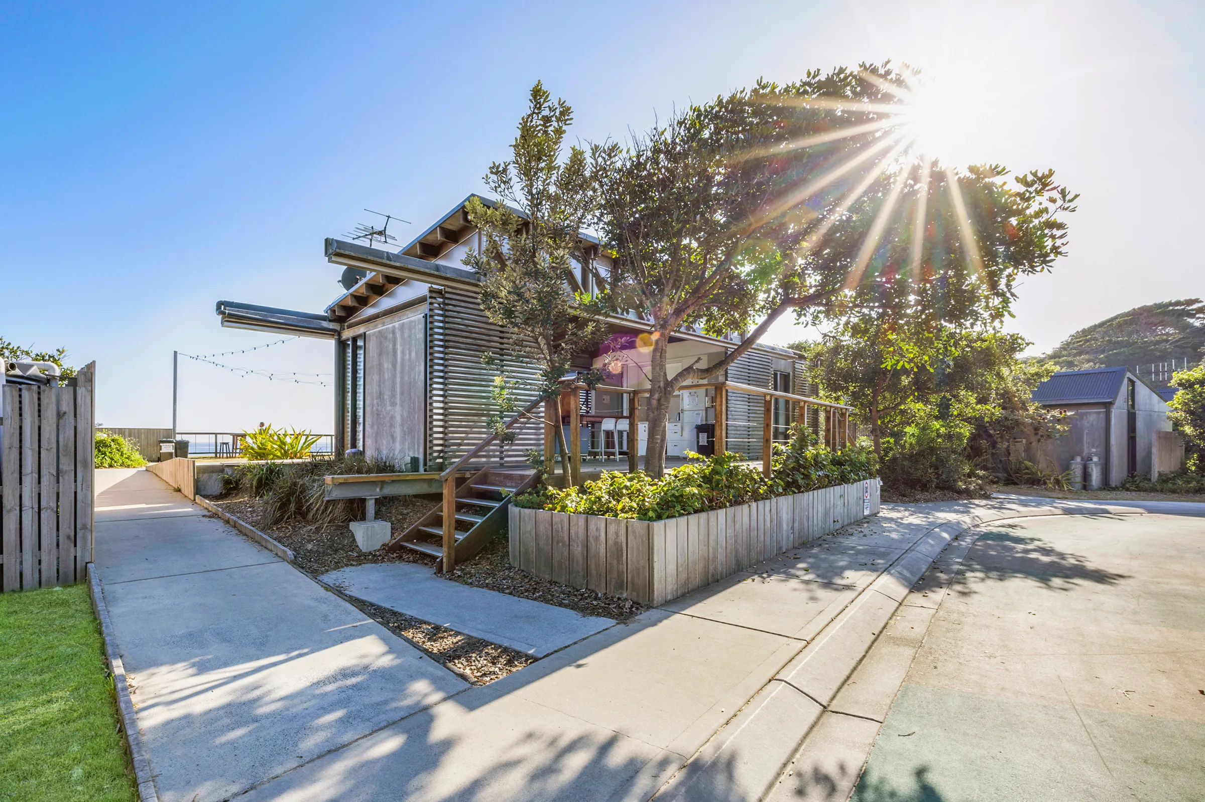 Seal Rocks Caravan Park guest lounge entry side access