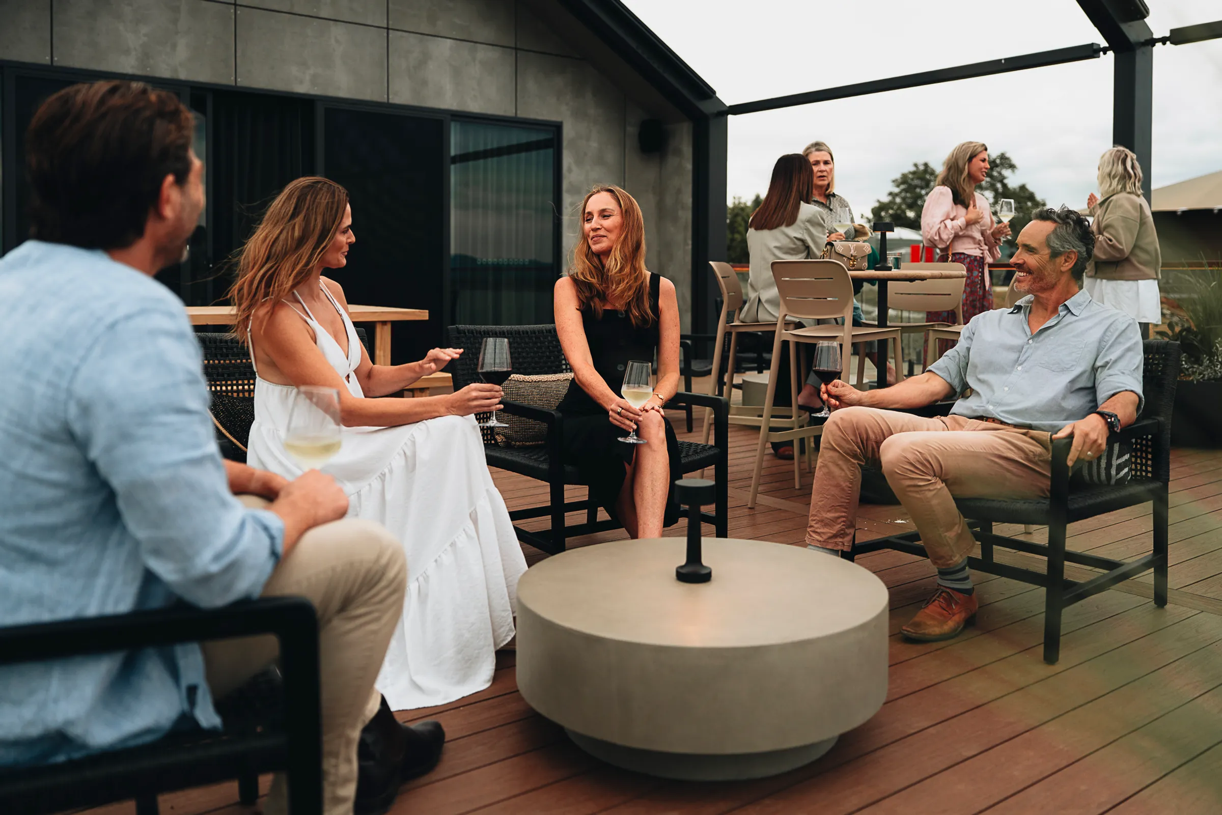 Relaxing on the deck of the Gilay Lounge at Lake keepit
