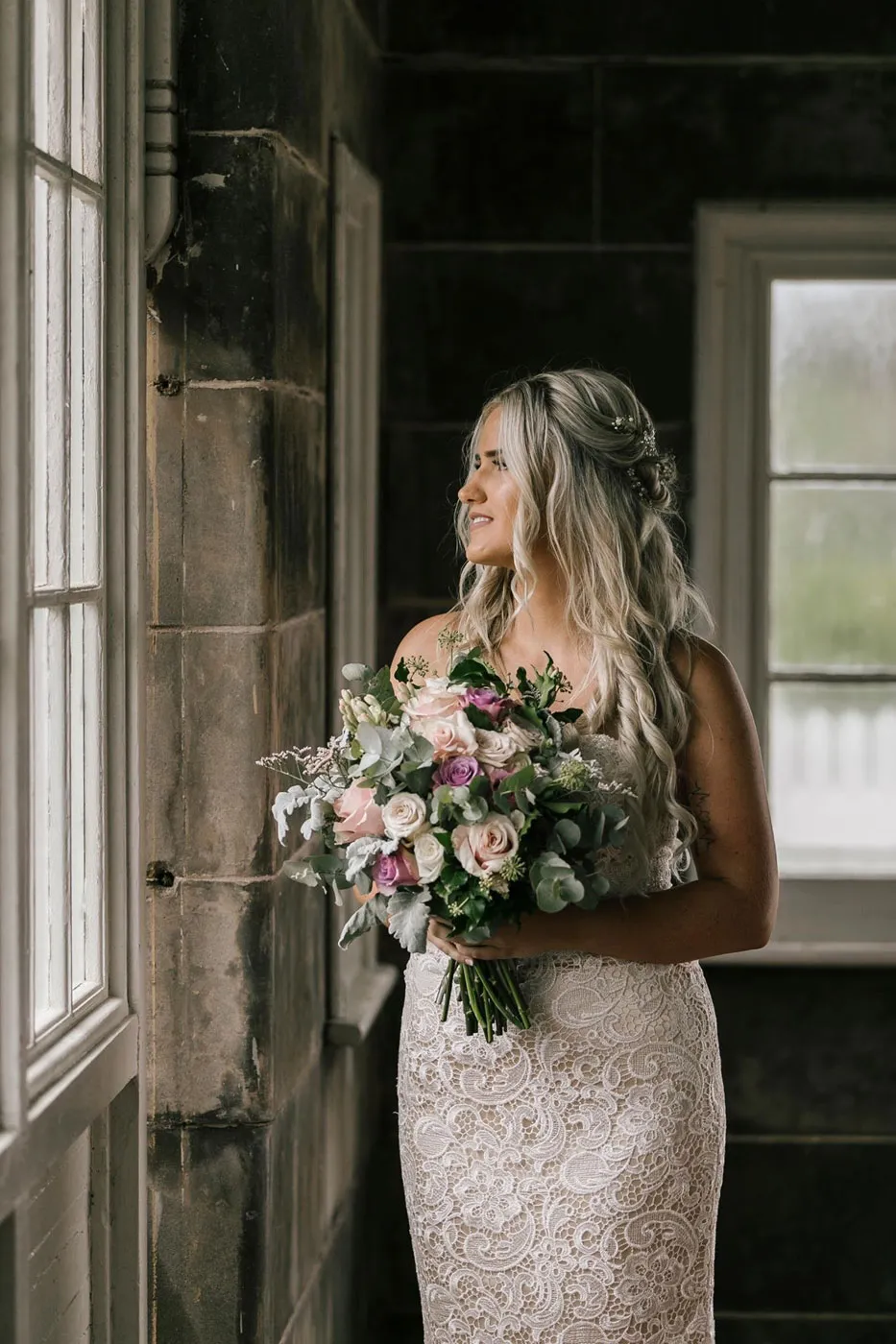 norah head lighthouse weddings bride holding wedding bouquet