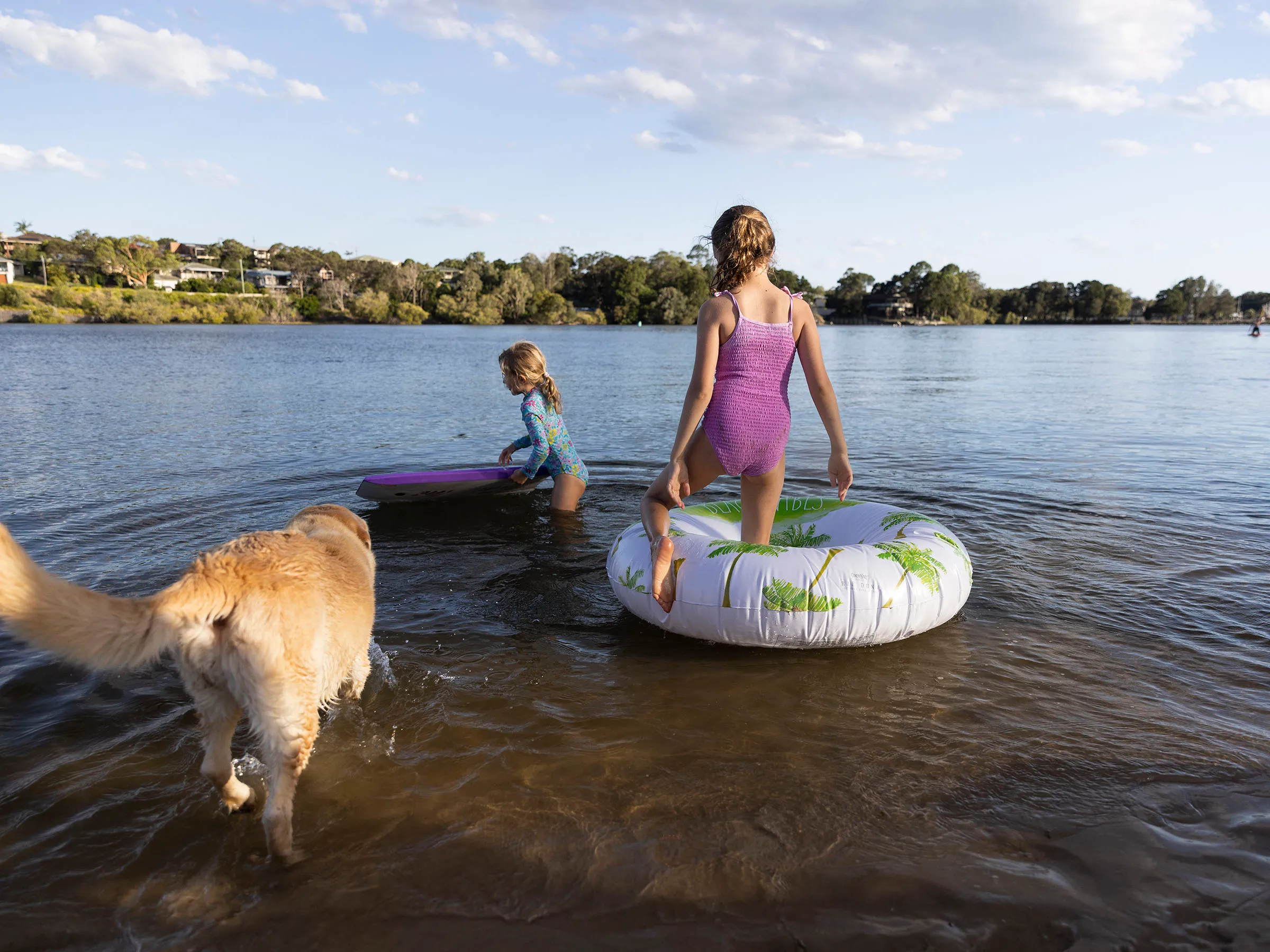 Reflections Holidays Evans Head holiday & caravan park kids and dog playing on Evans River