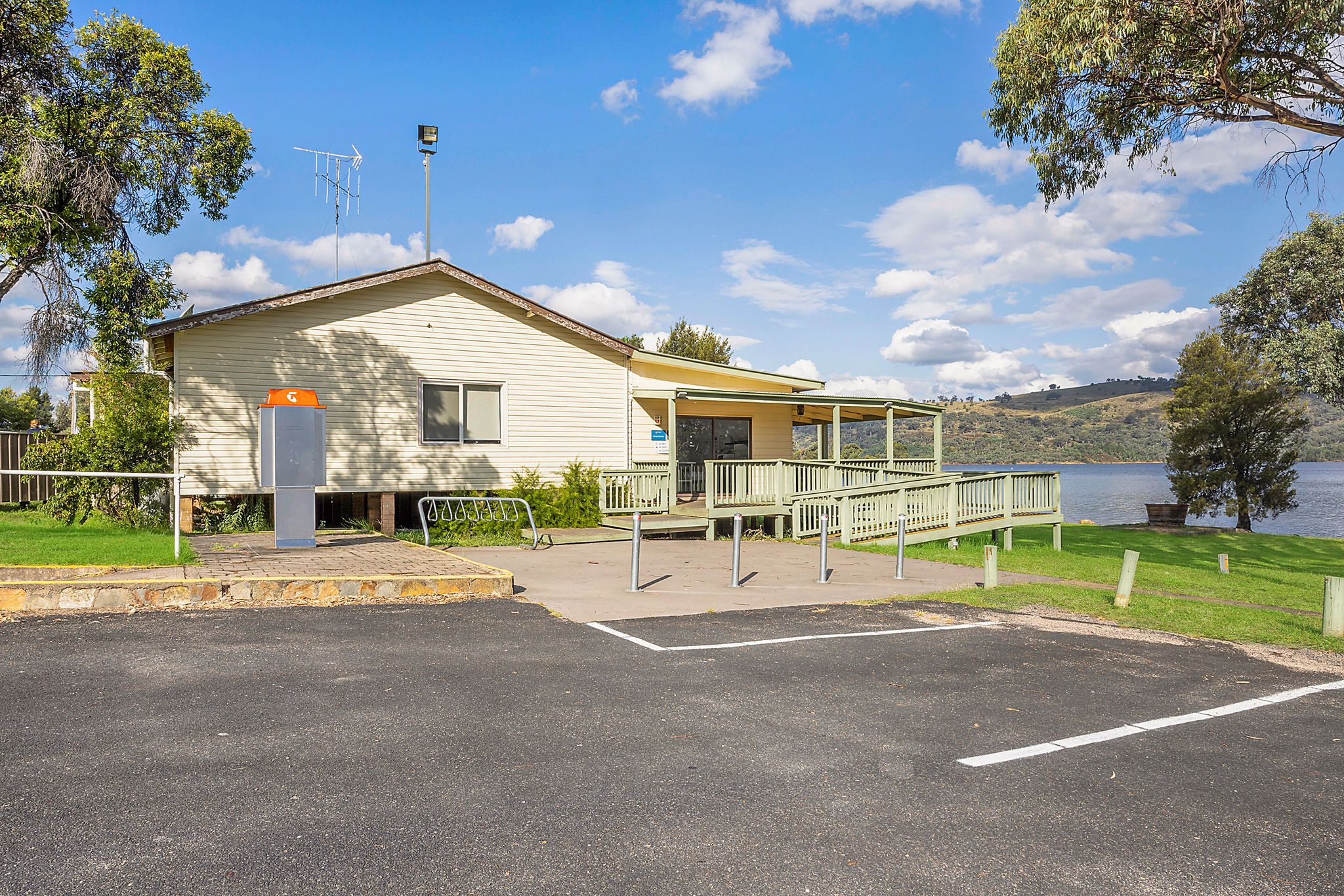 Exterior view of the camp kitchen at Reflections Wyangala Waters, located beside the lake with ramp access and parking out front