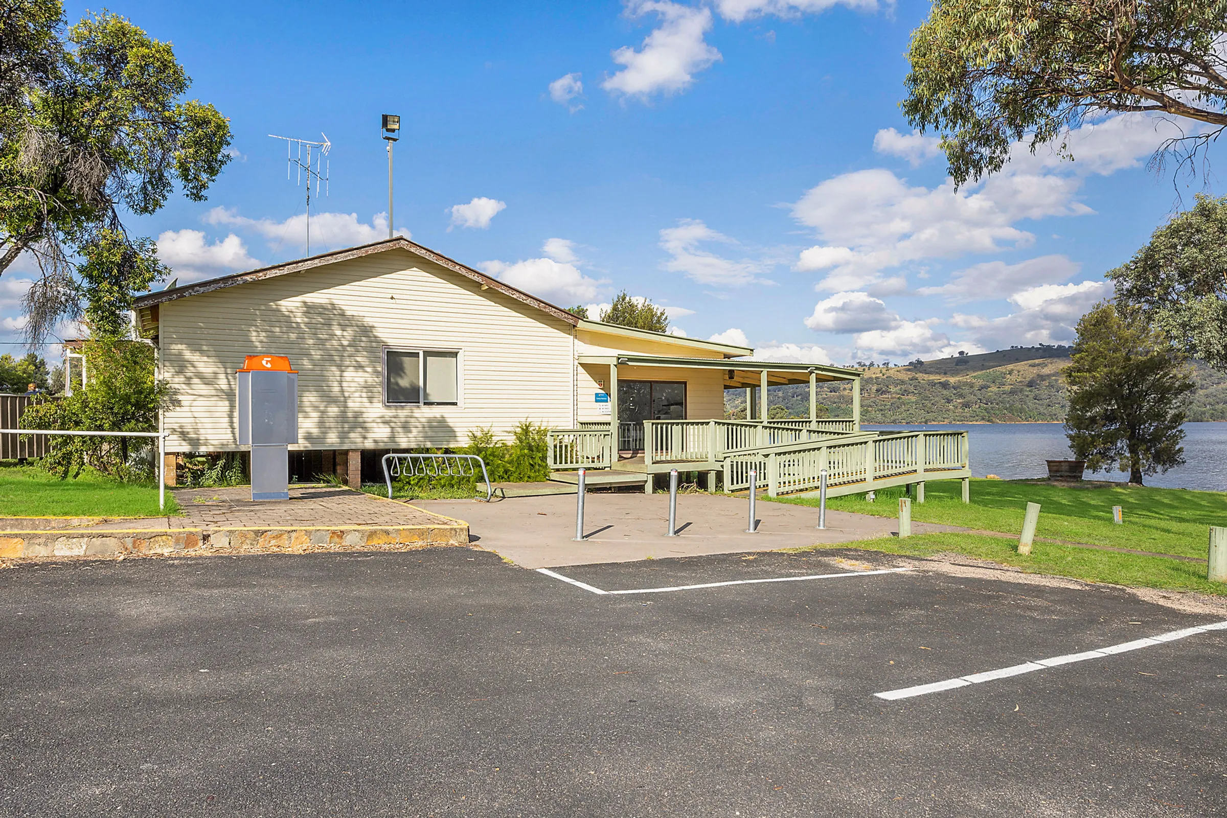 Exterior view of the camp kitchen at Reflections Wyangala Waters, located beside the lake with ramp access and parking out front