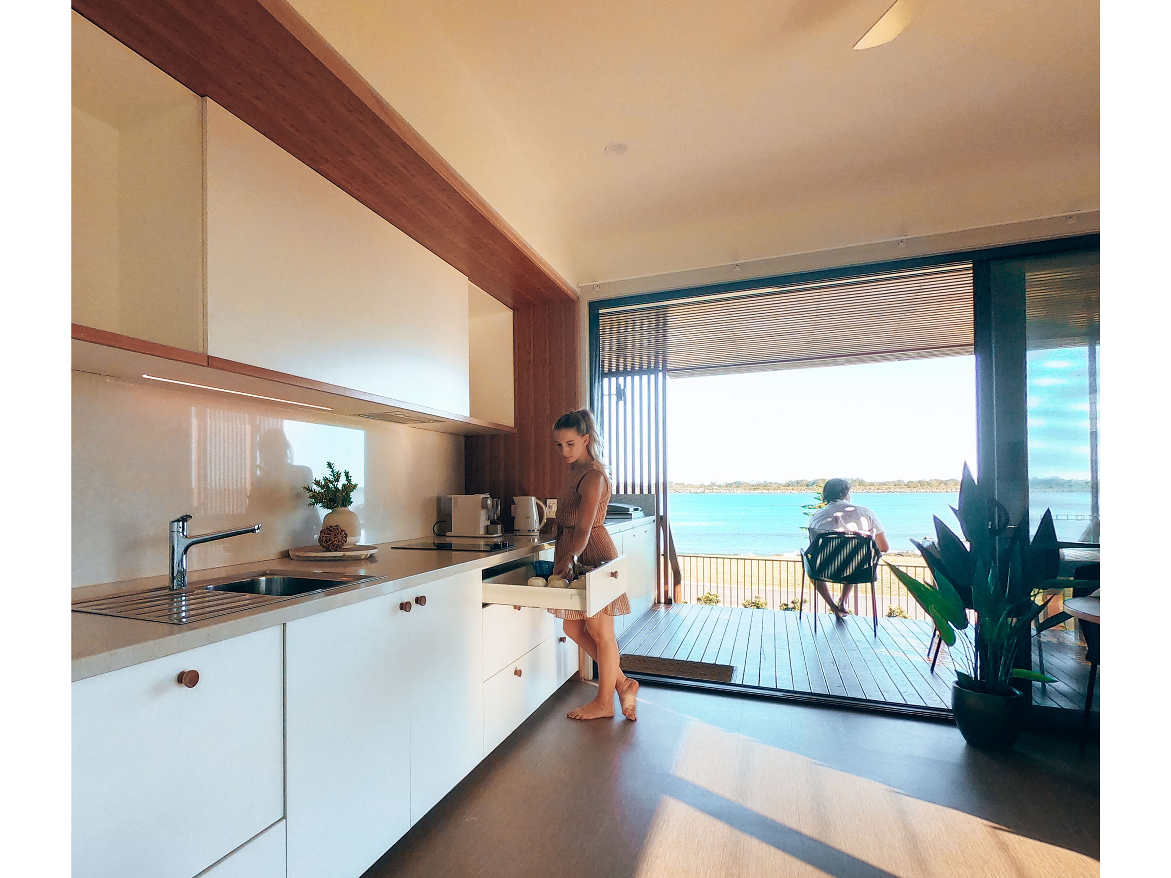Reflections Shaws Bay holiday and caravan park kitchen in premium villa