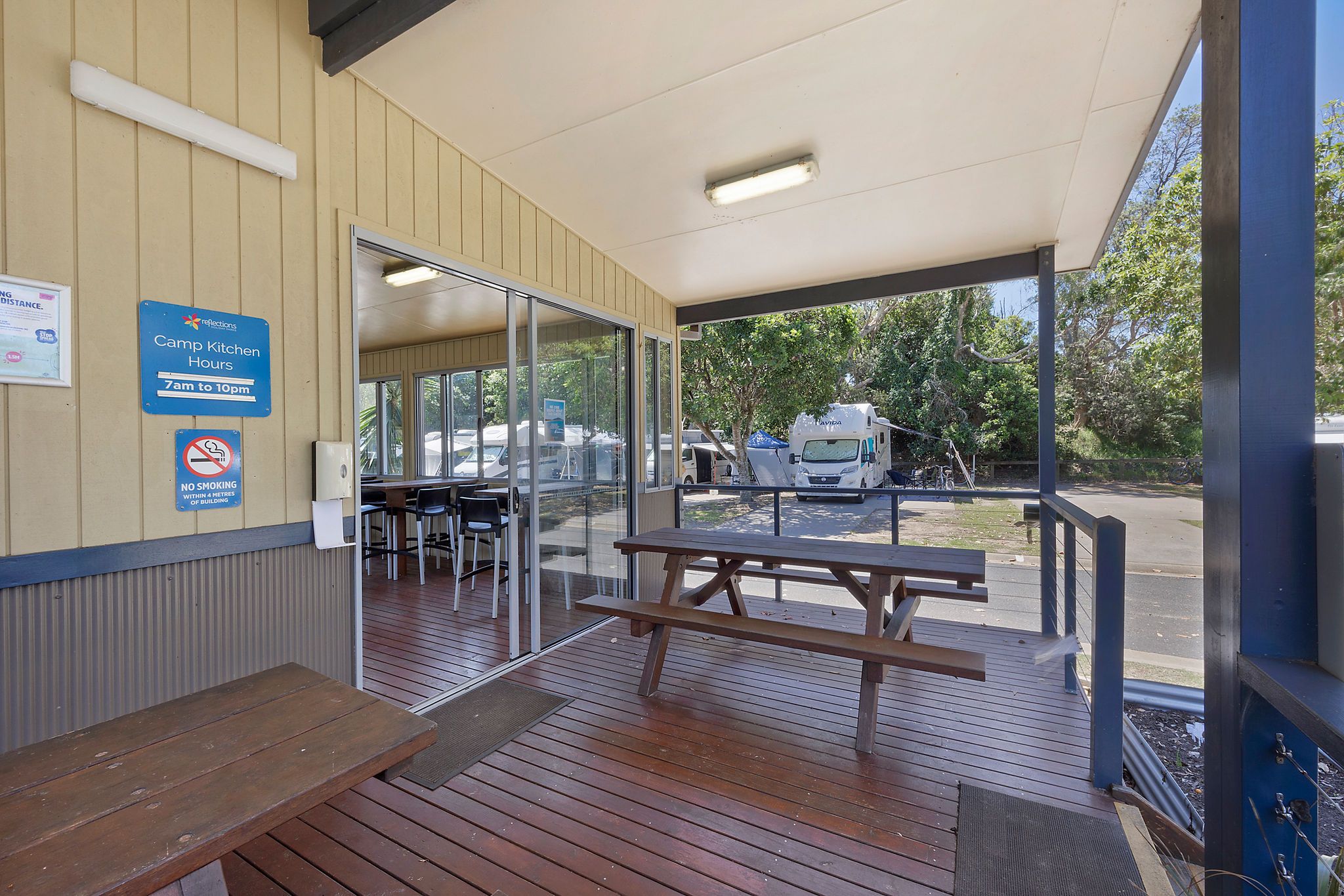 Comfortable seating area inside the camp kitchen at Reflections Scotts Head, perfect for relaxing and socializing