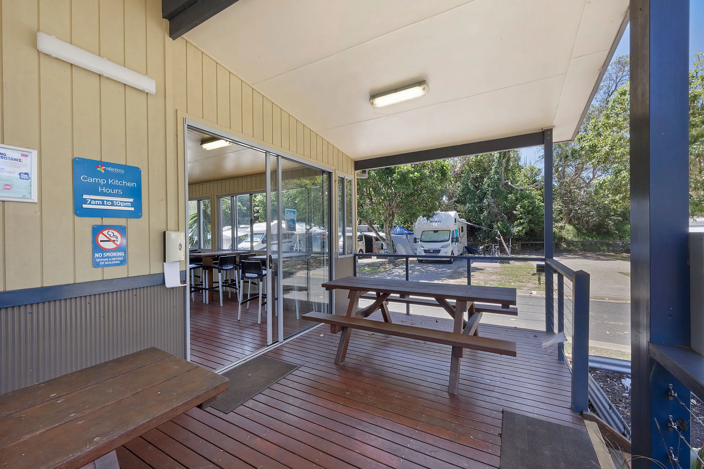 Comfortable seating area inside the camp kitchen at Reflections Scotts Head, perfect for relaxing and socializing