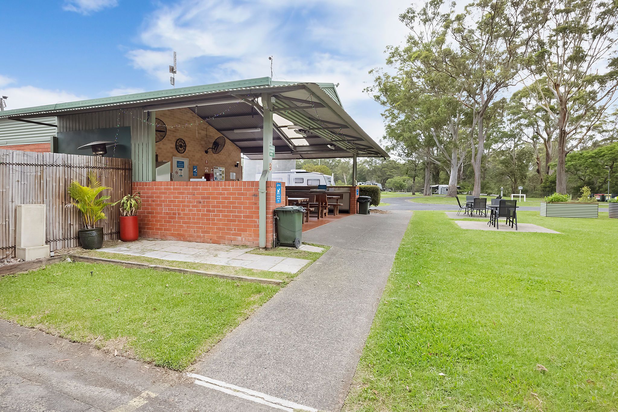 Spacious cooking and dining setup in the camp kitchen with fridges and sinks available.