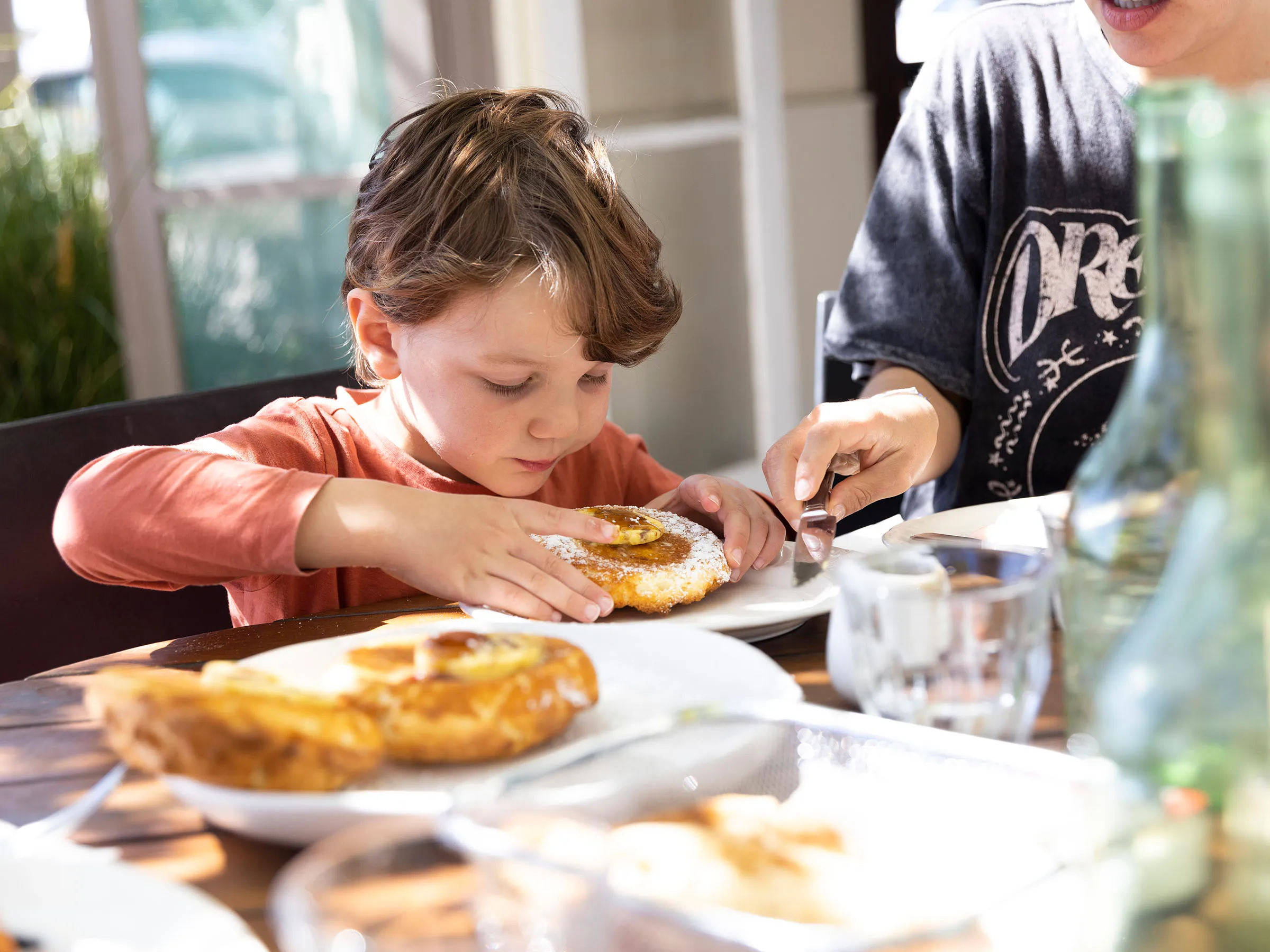 Reflections Holidays Hawks Nest holiday & caravan park kid eating breakfast