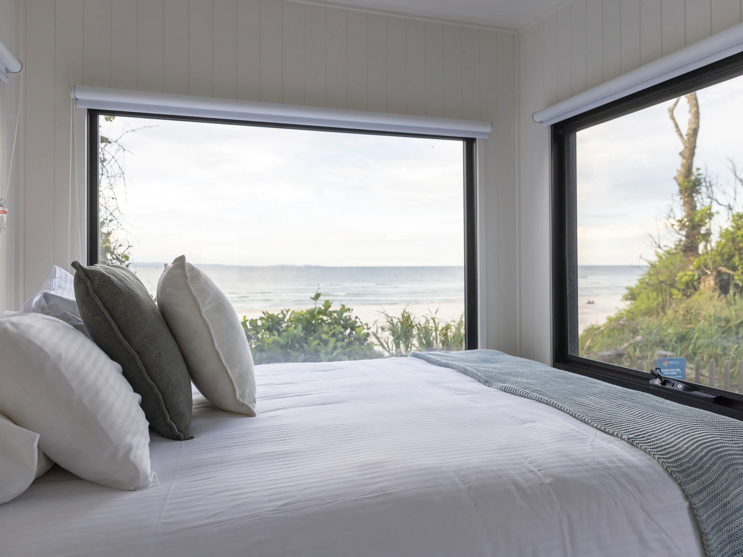 Reflections Holidays Byron Bay holiday & caravan park tiny home accommodation ocean view from bedroom