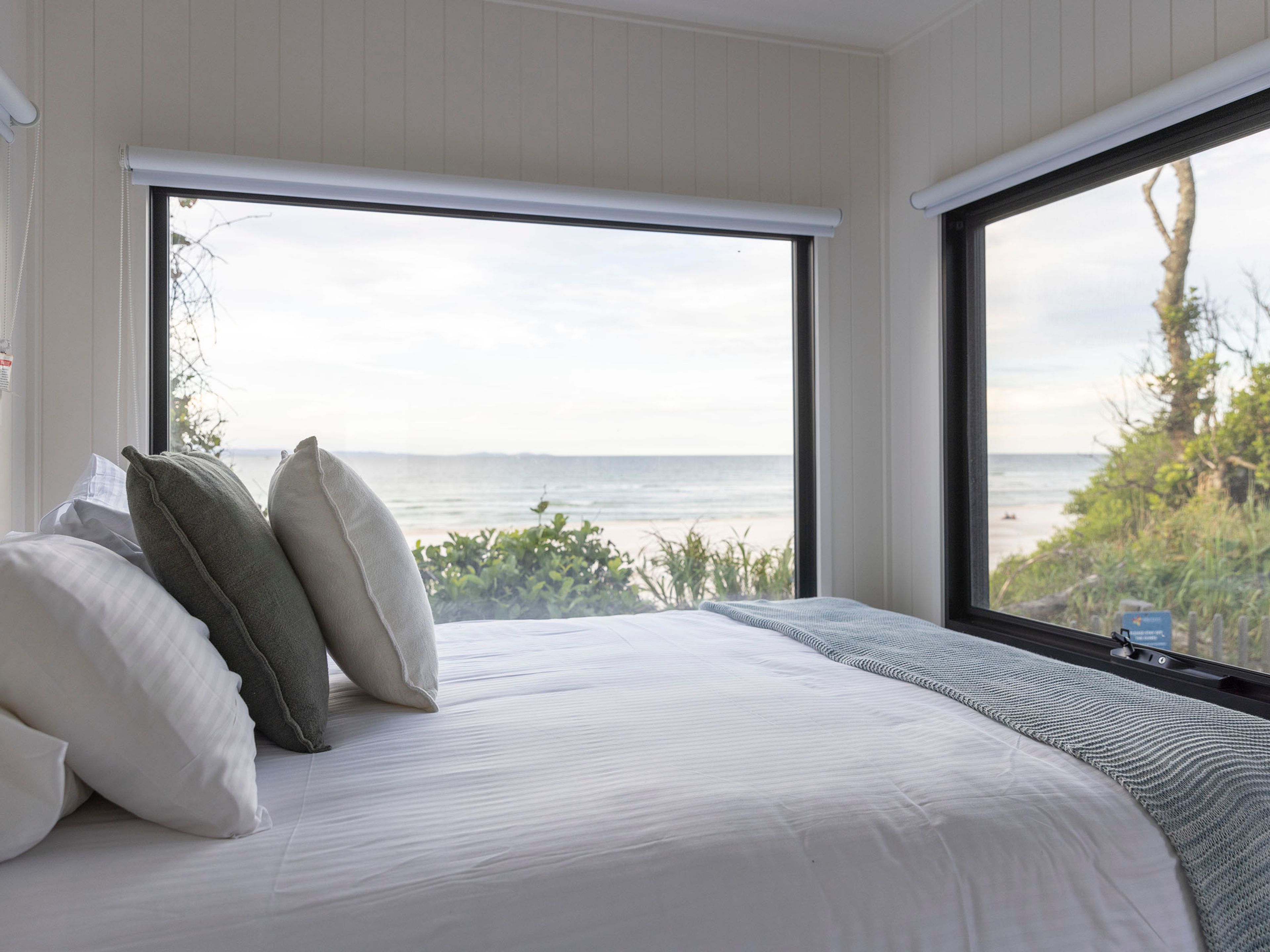 Reflections Holidays Byron Bay holiday & caravan park tiny home accommodation ocean view from bedroom