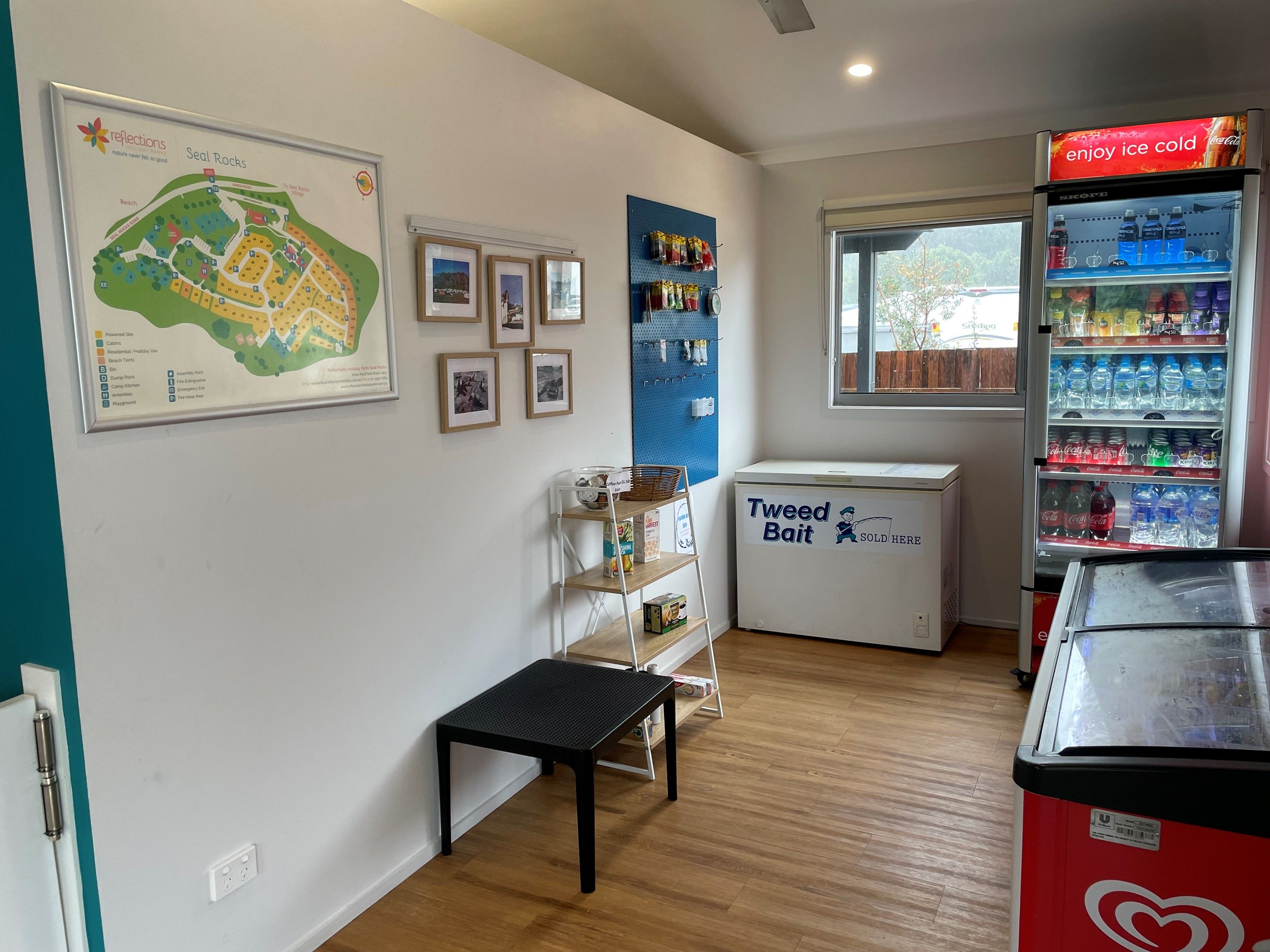 People walking too available kiosks at a reflections holiday park