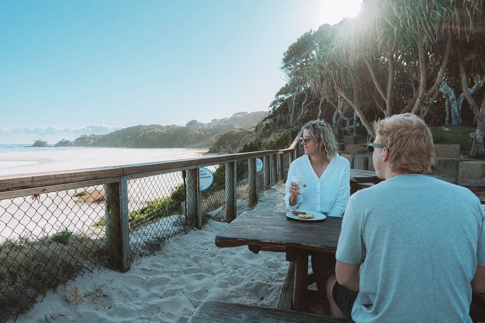 People enjoying the ocean view of Clakes Beach from Reflections Byron Bay