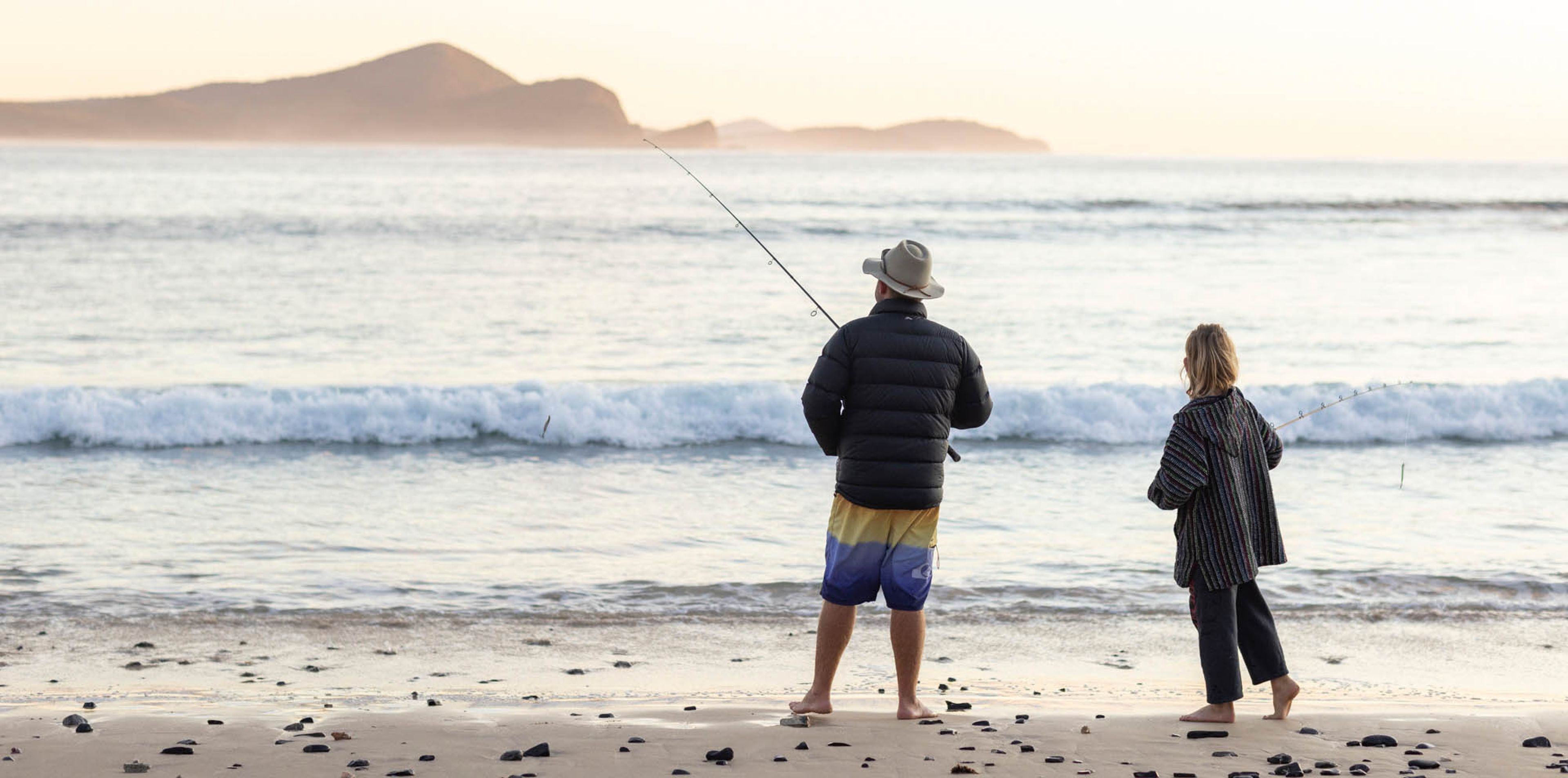 People fishing on a beach in NSW