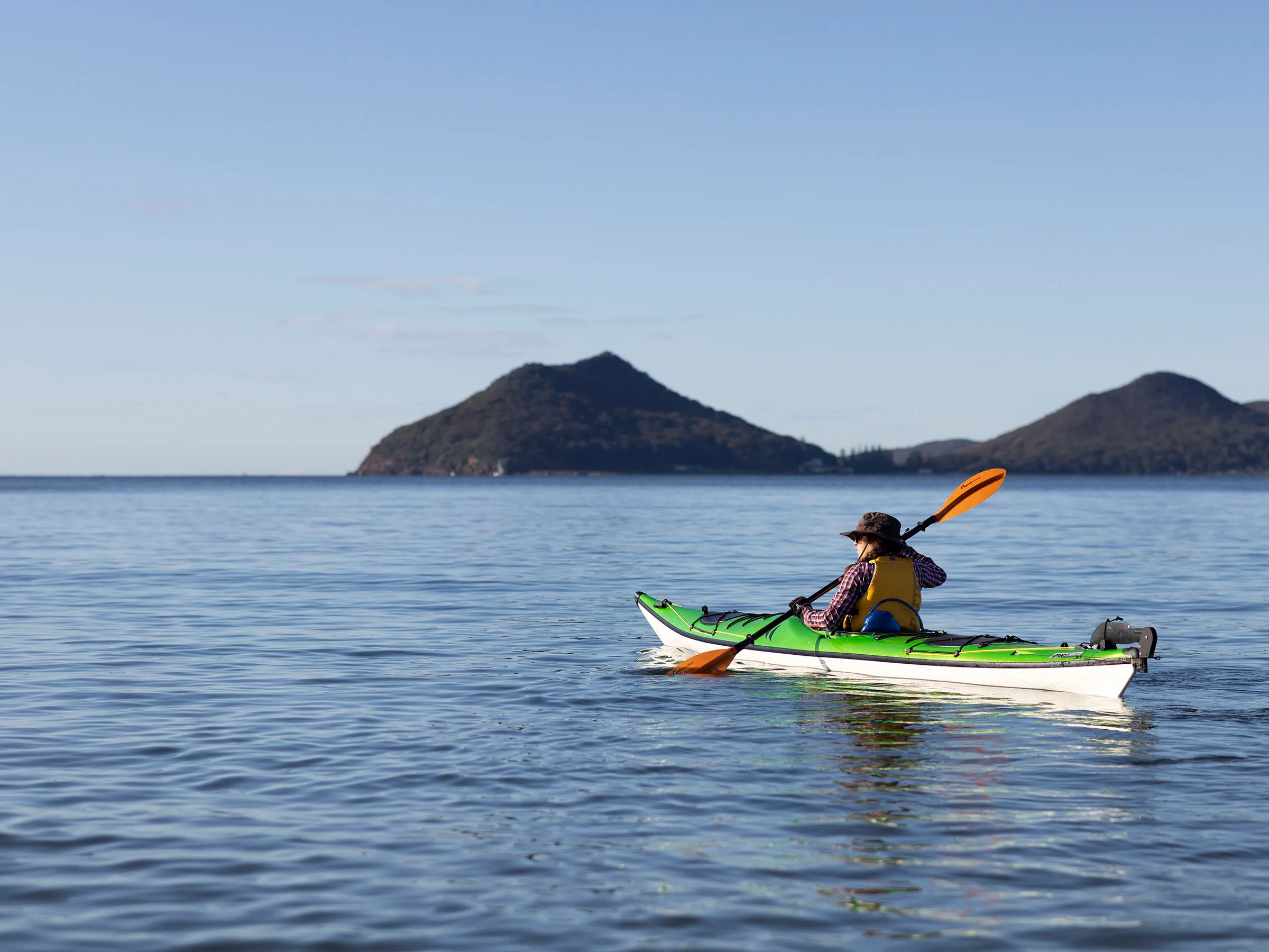 Reflections Holidays Jimmys Beach holiday & caravan park person kayaking Port Stephens Bay