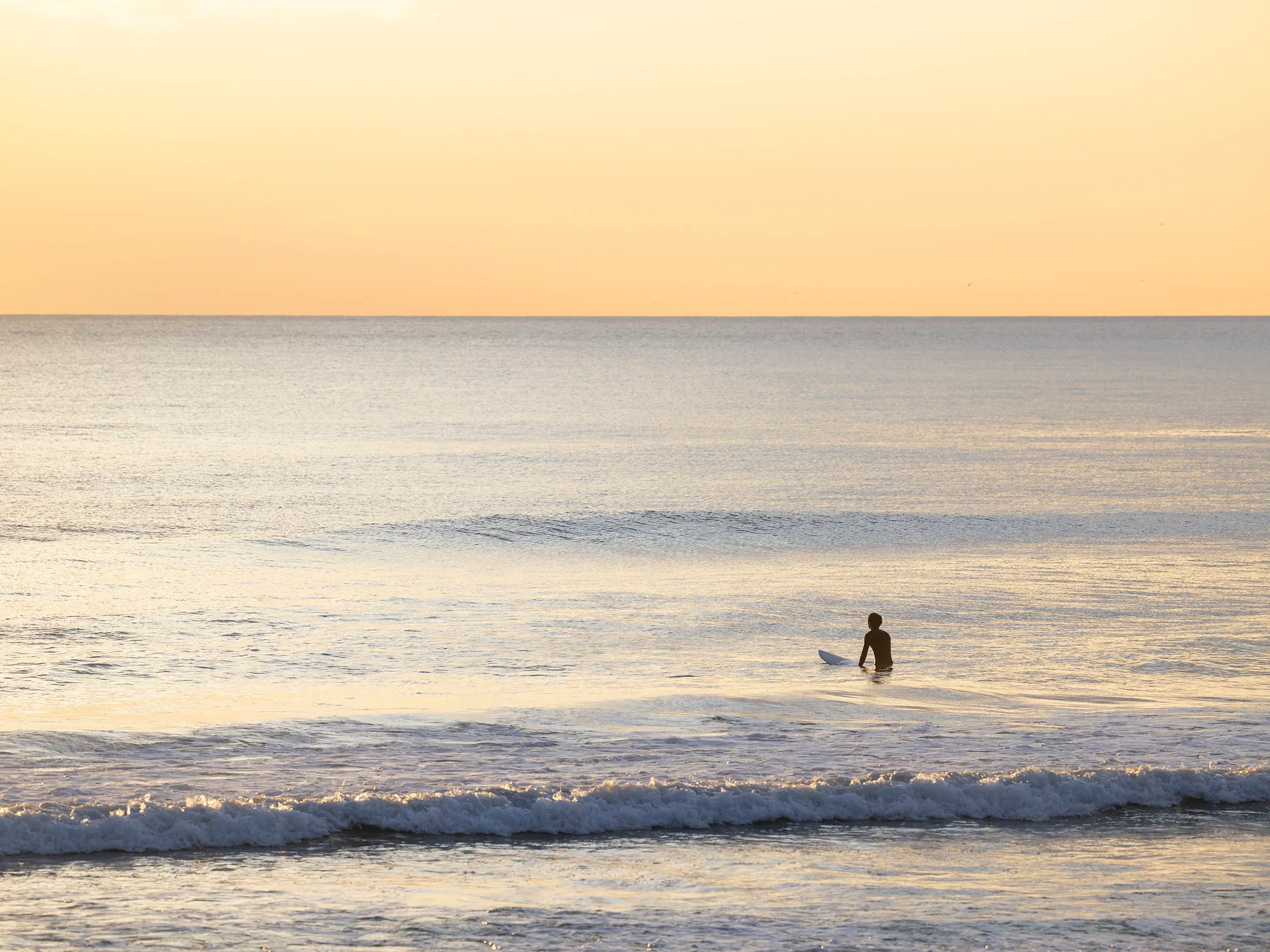 Reflections Holidays Lennox Head Person surfing